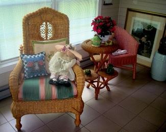 Ornate wicker arm chair with adjustable back by Polo Ralph Lauren and stand in natural color wicker.