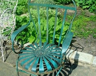 Antique mid century spring seat arm chair.