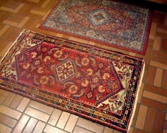 Hand knotted oriental wool area rugs.