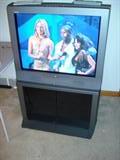 32" Sony Trinitron flat-screen TV with cabinet base, remote & manual. Excellent condition.