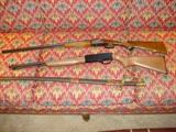 Winchester 22 rifle, model 9200. Stunning Davidson 410 gauge antique rifle ; it has lots of scrimshaw work and checkering. Authentic Civil War sword, Boyle & Gamble.