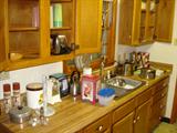Kitchen full of pots/pans, casserole dishes, small appliances, flatware, utensils, etc. 
