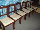 Set of 6 spindle back rosewood (Henredon, I believe) hand-carved, dining room chairs, one armed. Near mint condition.