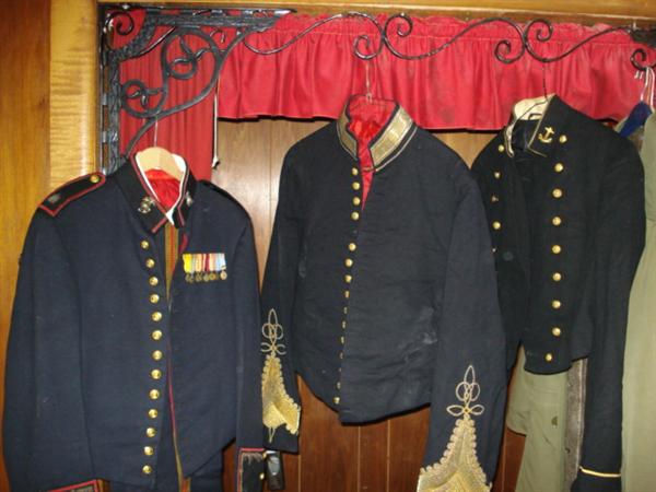 left to right: 1. WWII Lt Colonel dress blues with pants 2. WWI General dress blues (not sure we have pants) 3. WWII Major dress blues