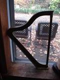 since this is a terrible picture of the miniature brass harp, check out the antique wrought iron chairs on the patio!