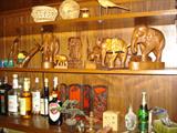 very collectible, detailed, hand carved teak items, mostly elephants