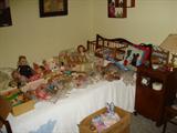 lots of barbie dolls, cases, doll furniture, clothing, bed, assessories, etc.