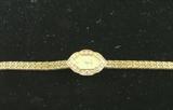 Ladies Audemors Piquet 18K gold, diamond bezel w/ aprox 1 carat of diamonds