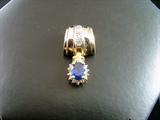 14K gold pendant with 1.0 carot sapphire & .25 carot diamond