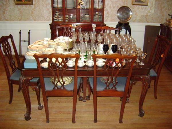 1920s Chippendale dining room table & 6 chairs; includes 2 leaves & pads; claw feet, mahoganey.  Following pics include the china cabinet and buffet