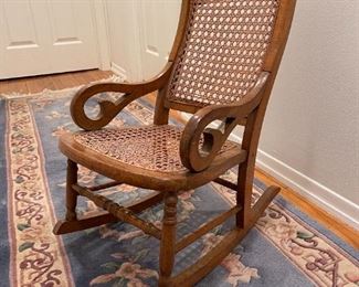 19th C. North American (Connecticut) Child's Wooden Rocking Chair With Cane Seat And Back