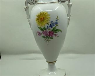 Porcelain Urn With Double Handles And Floral Motif On Footed Base, Marked With Blue Double Swords To Underside
Lot #: 20