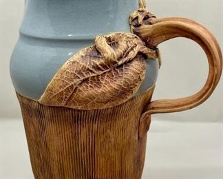 Vintage Blue And Brown Ceramic Pitcher With Foliate Design Signed By Artist Tewahima
Lot #: 37