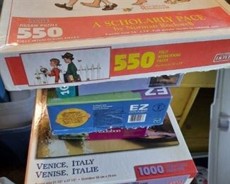 PUZZLES! A WHOLE TOTE BESIDES THESE MOST ARE NORMAN ROCKWELL PUZZLES