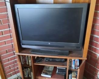 TV AND CORNER STAND, SOME VIDEOS AND NORMAN ROCKWELL LARGE BOOK