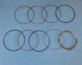 Nice assortment of 8 bangles (2 are copper) and a bracelet
