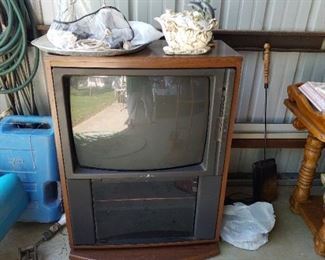 Vintage television in cabinet