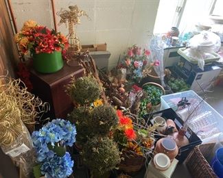 Tons of fake flowers and beautiful pots!