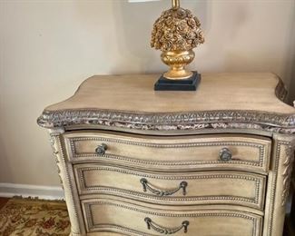Night Stand part of 
Empire BED ROOM SET - one night stand, mirror, dresser, queen size bed, chest- All 5 pieces. Hard to get collection with this quality. Original price over $8,000. You may notice some ware and tear if any. 
Description of mirror and dresser: 
Empire Il's dresser has nine drawers with a jewelry tray in the top left drawer. Featuring a marble edge and plenty of room for storage. Measurements: DresserLength:
68"Width: 21"Height: 40"MirrorLength: 42"Width:
Height: 46" If you've been waiting for a fresh, new interpretation of luxurious OldWorld styling, you're in luck. That's because when the design calls for an infusion of European inspiration, Empire I lets you fill your home with authenticity and elegance.Crafted with cherry veneers
and carefully finished in two versatile anddécor-friendly colors, this collection is a work of art. On the lighter side, there's a rich Parchment finish that's aged with crackle accents and tippedin silver highlights. 