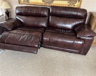 Full size leather sofa - 90in - with power recliner. Purchased recently. Lightly used.  One side of the recliner with a kick. The other side works perfectly.  Reduced to $500