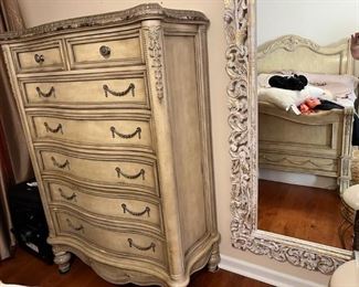 Chest part of bedroom set 
Empire BED ROOM SET - one night stand, mirror, dresser, queen size bed, chest- All 5 pieces. Hard to get collection with this quality. Original price over $8,000. You may notice some ware and tear if any. 
Description of mirror and dresser: 
Empire Il's dresser has nine drawers with a jewelry tray in the top left drawer. Featuring a marble edge and plenty of room for storage. Measurements: DresserLength:
68"Width: 21"Height: 40"MirrorLength: 42"Width:
Height: 46" If you've been waiting for a fresh, new interpretation of luxurious OldWorld styling, you're in luck. That's because when the design calls for an infusion of European inspiration, Empire I lets you fill your home with authenticity and elegance.Crafted with cherry veneers
and carefully finished in two versatile anddécor-friendly colors, this collection is a work of art. On the lighter side, there's a rich Parchment finish that's aged with crackle accents and tippedin silver highlights. 