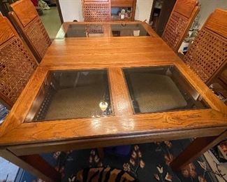 Contemporary oak dining table/6 chairs, glass inserts