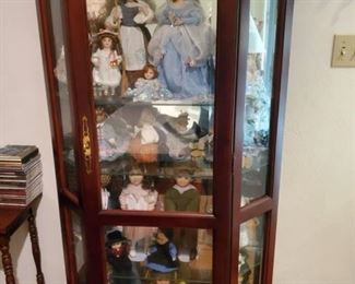 Curio cabinet & porcelain dolls