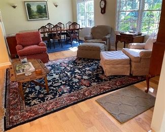 Coffee table, grey-brown chair and ottoman and antique rug for sale.  
