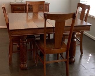 Antique Quarter-sawn “Tiger” Oak Dining Table with 5 Bulbous Column Legs.  Shown with a set of 4 Tiger Oak T-Back Chairs with Solid Wood Seats 