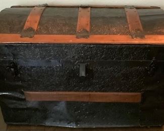 Antique Embossed Metal Trunk with Wood Slats and Leather Handles.  (28”W x 15” x 17”D)    