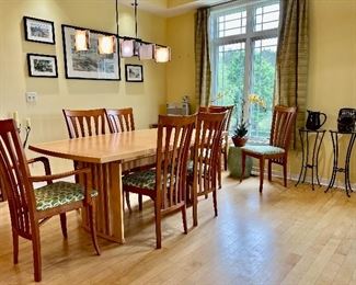 Skovby Danish Modern Dining Room Table and 8 chairs. Table has 2 self storing leaves