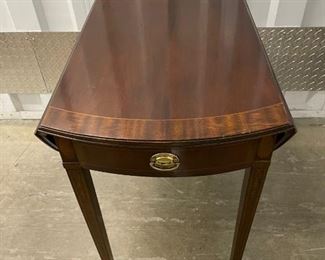 $540 - Matching Pair Drop Leaf End Councill Craftsmen Wood End Tables - KS83-3
LOCATION: Germantown, MD
WHY WE LOVE IT:  Well respected high-end American made mahogany Adams Style drop-leaf end table by Councill woodworkers of Michigan. C 1980s, tapered inlaid legs, brass pull and banded tops and drawers. Councill is part of the ultra high-end Karges furniture family.
DETAILS + DIMENSIONS: 17" x 30" x 27" Closed, 38" x 30" x 27" Open
CONDITION: Please refer to photos for a more detailed look at condition.  We make every attempt to list and photograph any defects or signs of wear that are significant to this sale. 
LOCAL PICK UP.   BUYER IS RESPONSIBLE FOR ANY NECESSARY DISASSEMBLY AND ALL COSTS ASSOCIATED WITH SHIPPING OR PICK UP.  PLEASE CONTACT US FOR SHIPPING REFERRALS.