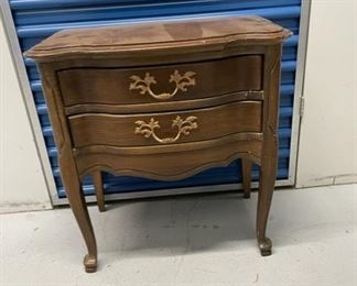 $90 - Serpentine Two Drawer End / Side Table With Brass Hardware - KS83-1
LOCATION: Germantown, MD
DIMENSIONS: 24" x 14" x 25"
CONDITION: Please refer to photos for a more detailed look at condition.  We make every attempt to list and photograph any defects or signs of wear that are significant to this sale. 
LOCAL PICK UP.   BUYER IS RESPONSIBLE FOR ANY NECESSARY DISASSEMBLY AND ALL COSTS ASSOCIATED WITH SHIPPING OR PICK UP.  PLEASE CONTACT US FOR SHIPPING REFERRALS.