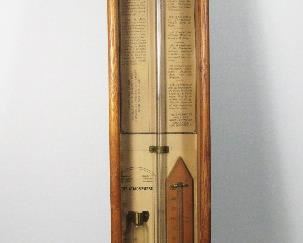 Lot 127   1880 Oak Cased “Admiral Fitzroy” Wall Barometer/Thermometer, 36 ½” X 5 ¾” X 2 ½”. Cond: Case shows minor wear. Liquid missing from 1 interior tube. Unknown cleaning device loose in bottom.   $150 - $200