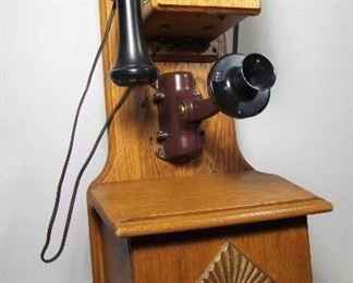 Lot 150   C/1890 Restored Oak Wall Phone. Original Brass tag marked “Elliott Telephone Co., Indianapolis IN”. Magneto is present, 12” X 11” X 32”h. Cond: Fully re-finished & restored.    $200 - $300