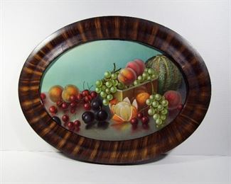 Lot 248   C/1890 Oval Chromolitho of Fruit still life in a grained plaster frame, 24” x 18 ½” h.  Cond: No damage to print, minor wear to frame.     $50 - $80