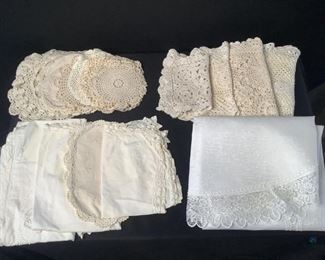 Assortment of crochet lace doilies, cloths, tablecloths and more! See photos for details.