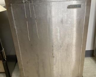 Shelley Mfg. Co. Stainless steel storage cart on castor wheels, used condition, H 36"x W 23"x D 19".