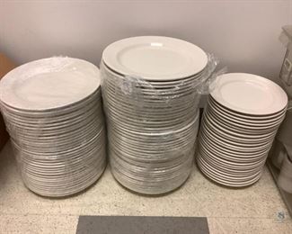 Oneida dinnerware, approximately (75) 9" plates and approximately (26) 7" plates. Also, Oneida 3.5" coffee cups without handles, approximately (55). Includes approximately (70) coffee mugs stamped "Made in Mexico". All are used condition and may have chips or cracks, some items come in boxes.