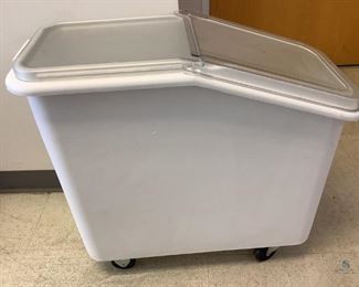 One Rubbermaid white plastic food storage bins on castor wheels, with lids, Model# 3600, H 28"x W 13.5"x D 31", used condition.