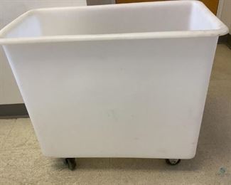 One Cambro white plastic food storage bins on castor wheels, Model # IB36, H 27.5"x W 15"x D 29.5, used condition.