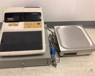 One Sharp register, Model# ER-A650, comes with key, H 13"x W 17.5"x D 19". Scale SN# PD084239, H 5"x W 14"x D 12". All are used, unknown working condition.