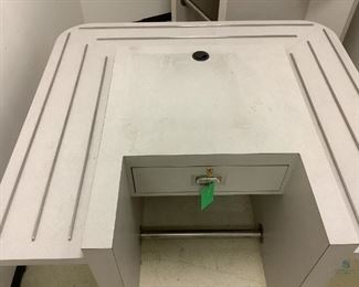 One Cashier 3-sided moveable station with center drawer, comes with key, castor wheels not attached, H 28"x W 52"x D 48"