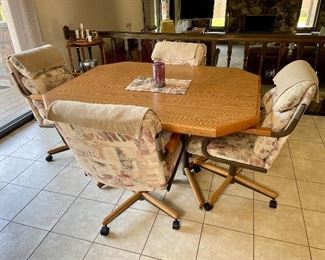 Kitchen table and four chairs, includes two leaves