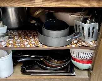 Cookware, bakeware, pots and pans, Pyrex, cookie sheets, baking pans. 