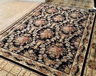 Black floral area rug