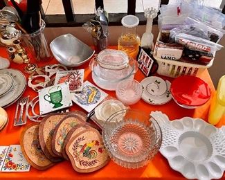 Coasters, hot pads, Tupperware, trivets,  glass bowls, tea pots, vintage candlesticks, milk glass.