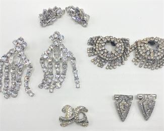 3 Vintage Clip-on Rhinestone Earrings & 2 Sets Dress Clips By Designers Trifari, Weiss & More
Lot #: 29