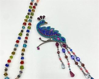 Large Vintage Rhinestone Peacock Pin & Glass Bead Necklace
Lot #: 6