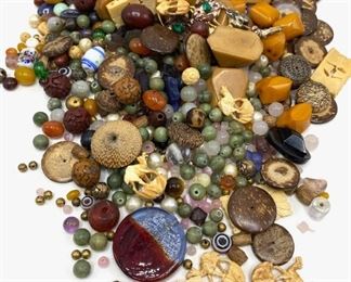 Loose Beads: Bakelite, Glass, Wood, Stone, Carved Shell Animals & More
Lot #: 87